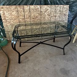 Outdoor glass top table