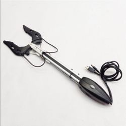 ER1 Gripper Arm Evolution Robotics. Includes manual, Robot Control Center disc, and accessories.