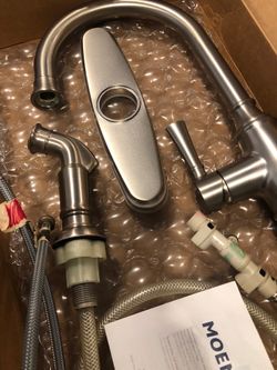 Moen faucet kitchen, wash tub, sink, laundry.