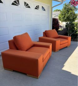 Pair of Oversized Contemporary Club Chairs in Terracotta / Oak Plinth Bases