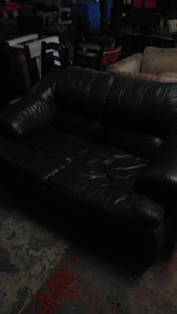 Blue leather loveseat