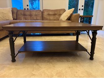 Wooden coffee table with metal legs