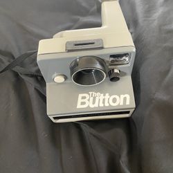 The Button Polaroid Land Camera