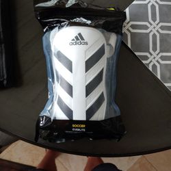 Adidas Large Shin Guards.