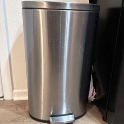 large steel garbage can
