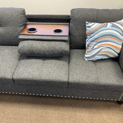 97.2" length cupholder Linen sectional with storage ottoman