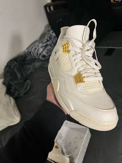 Jordan 4 metallic gold
