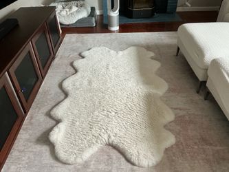 Two of these sheepskin type rugs from Costco