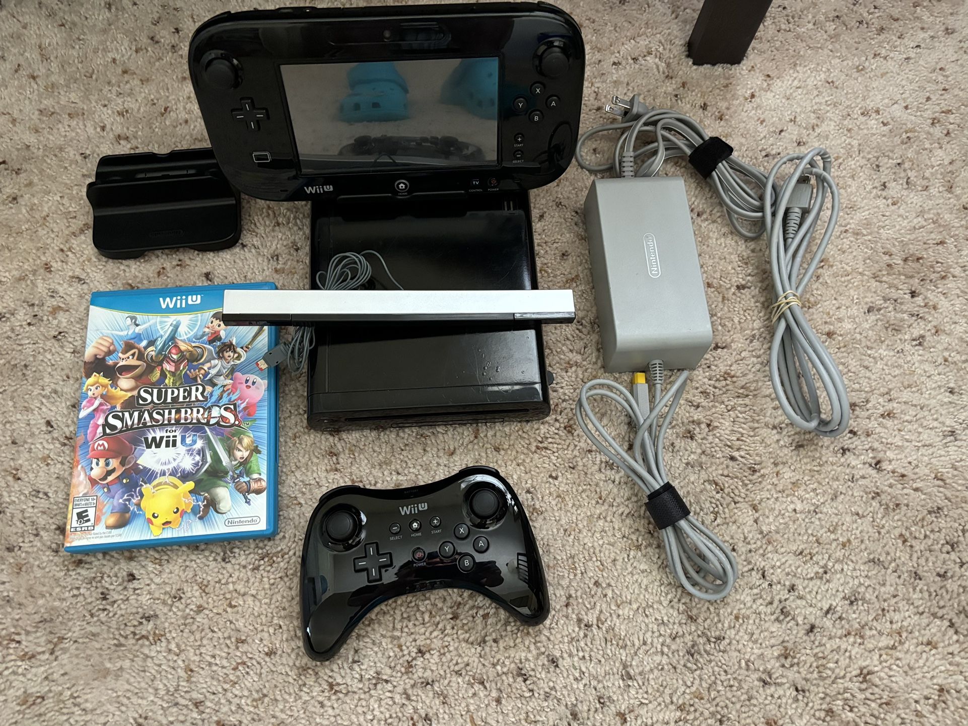 Nintendo Wii U bundle with power and HDMI cable, gamepad, and Wii U Pro controller with Smash Bros