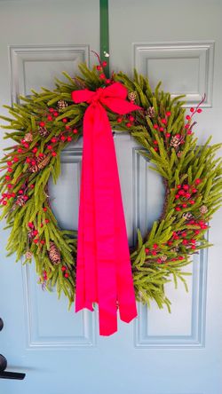 Christmas Wreath with Red Berries and Pinecones