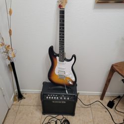 Eclectic Guitar With Amplifier 