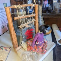 VINTAGE NAVAJO WOMAN EEAVING A RUG 