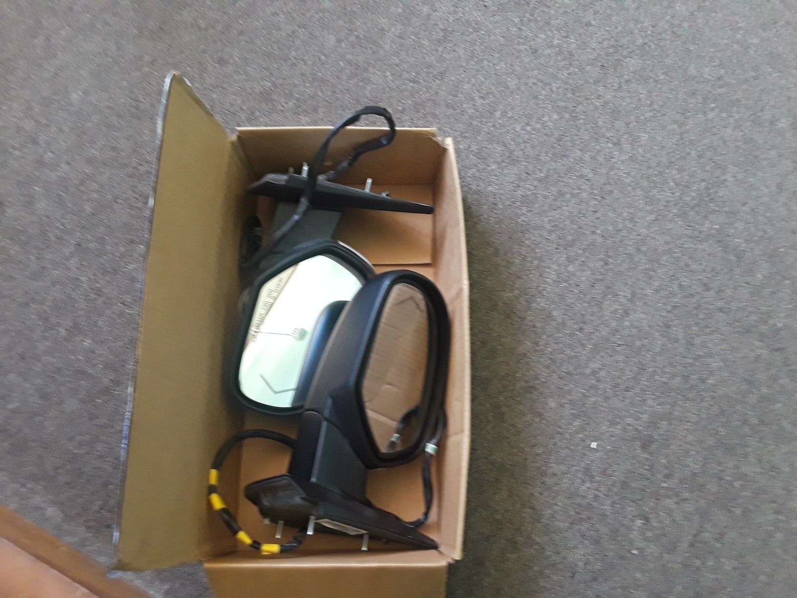 A pair of stock side mirrors on a 2012 GMC Sierra asking 50.00