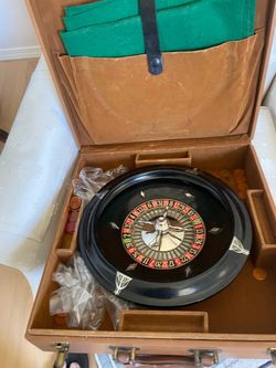 A roulette wheel with carrying case looks very nice