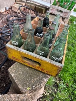 Title: Vintage Coca-Cola & 7UP Glass Bottles with Wooden Crates (1960s-70s)