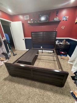 Queen sized wooden bed frame