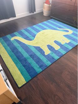 Dinosaur rug and wall art