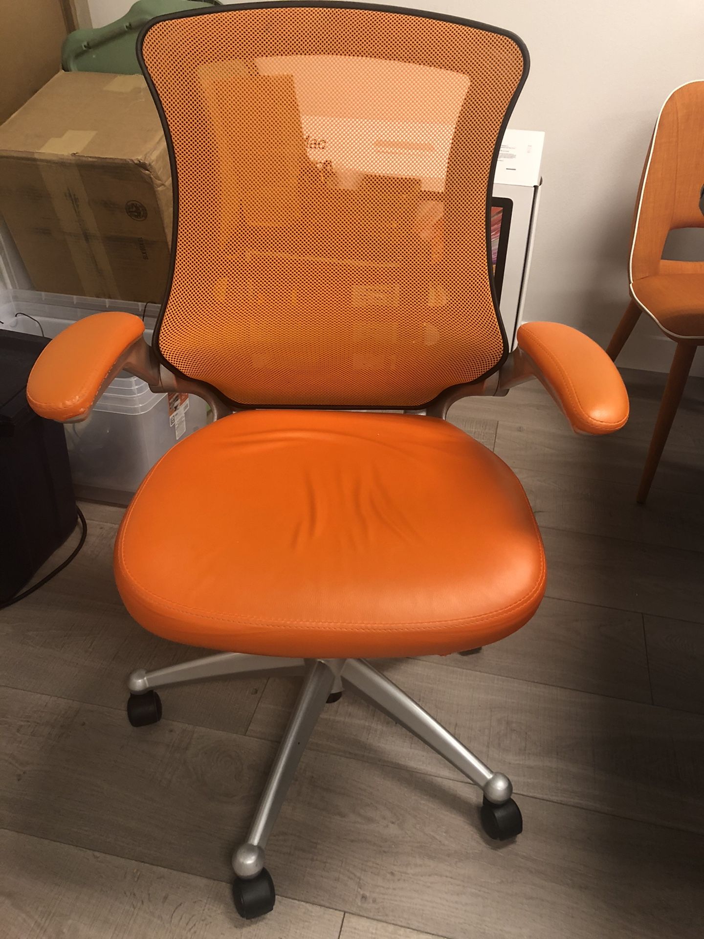 Modern orange office chair (lightly used 1 yr)