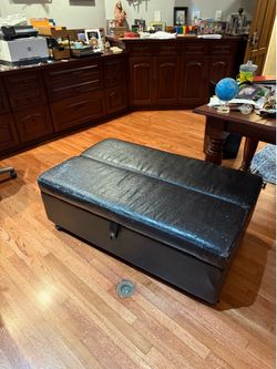 Ottoman that folds out to a single bed