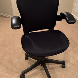 Black Desk Chair With Leather Arms And Adjustable Levers