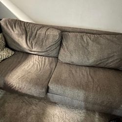 Grey Cloth Couch With Metal Legs
