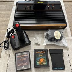 Atari 2600 (4 Switch) Joystick and Games
