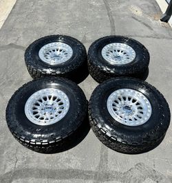 Brand New KMC IMS 17x8.5 Wheels and 35/12R17 TOYO Open Country AT3 Tires 6x139 -10 Offset