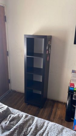 Dark brown shelf with wheels in good condition