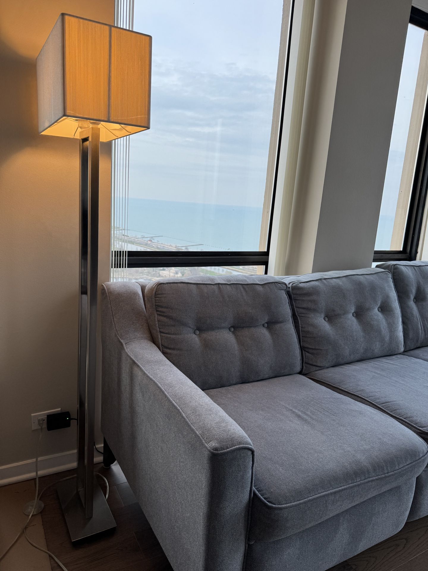 Grey Couch With Auto Reclining Seats and Built-in Chargers