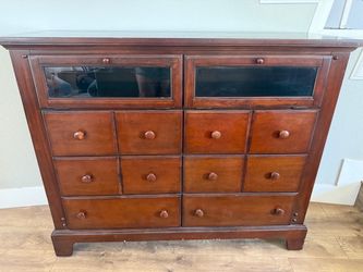 Solid wood dresser with glass front display drawers