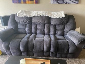 Reclining sofa with extendable table