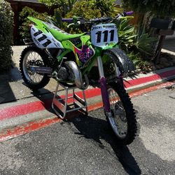 kx125 with extra parts and oils 