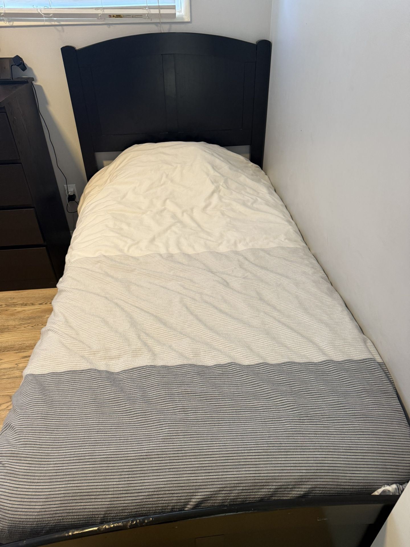 Two twin beds with mattress and dresser