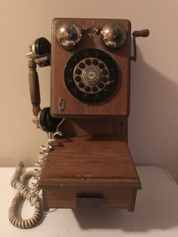 Antique looking Spirit of St Louis wall phone