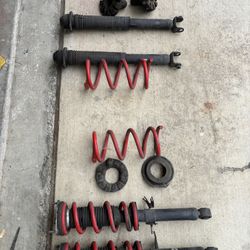 G37 Stock Struts + Lower Springs