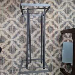 2 tiered adjustable shoe rack.