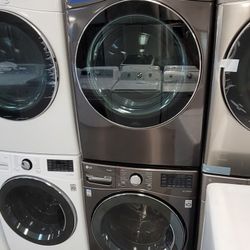 used like New 2021 LG Front Load Washer and NEW LG Stackable Gas Dryer Set in Black Stainless Steel