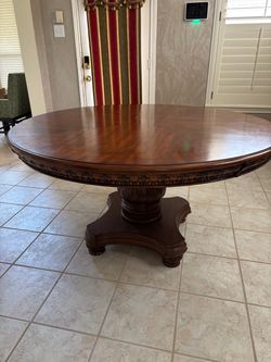 Round Wood Pedestal Dining Table