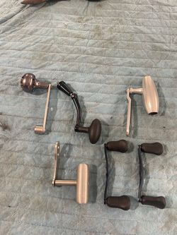 Reel handles