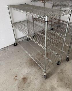 3 tier heavy duty metal shelving unit on wheels
