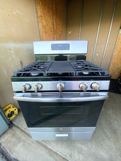GE gas stove 5 burners stainless st with griddle.  30”