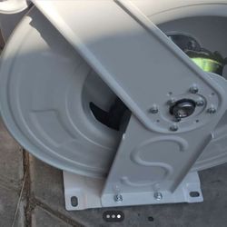 Retractable real with hose 100 feet