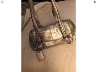 Tignanello leather handbags.. silver handbag