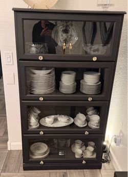 Black bookcase-dishes not included