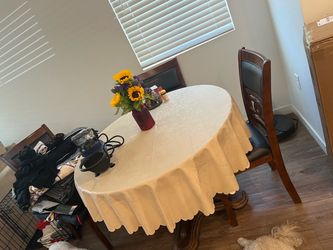Dinner table with chairs