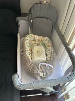 Bassinet, diaper bag, baby lounger and wipe warmer All Like New Condition