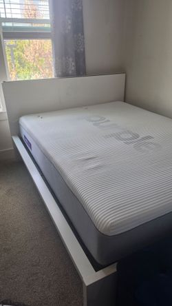 Purple hybrid sized queen mattress and bedframe
