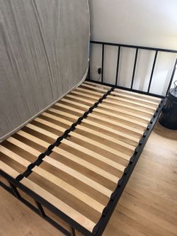 Queen black metal bed frame (crate and barrel)