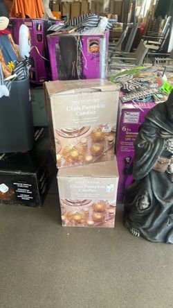 Glass pumpkin candles