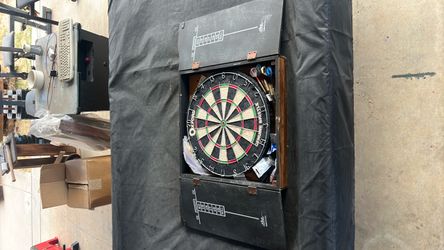 Dartboard with wall mounted dartboard playing box